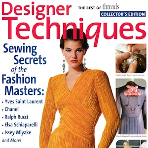 May include: A magazine cover titled Designer Techniques: The Best of Threads Collector's Edition. The cover features a person in a textured mustard yellow long-sleeve dress, with smaller inset images showing sequin work and a garment with face embroidery.