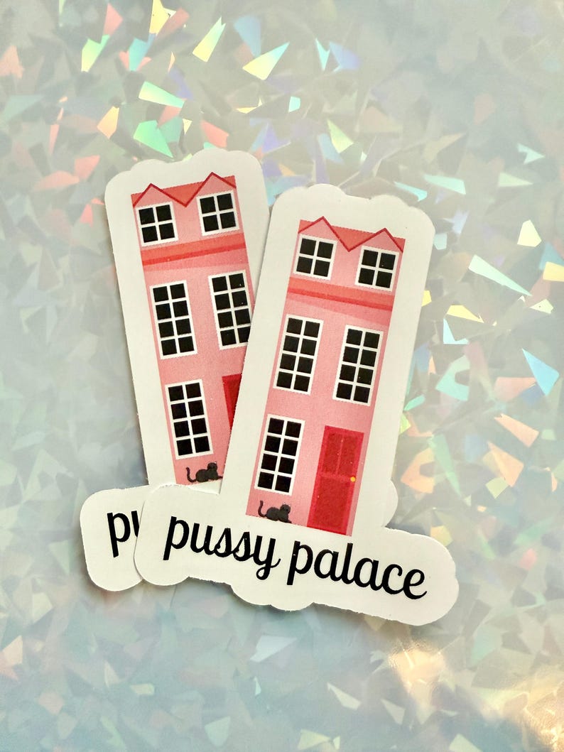 May include: Two stickers featuring pink house illustrations with black windows and doors, and a black cat silhouette. The stickers have the text "pussy palace" in a cursive font.