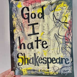 May include: Mixed media artwork with the text "God I hate Shakespeare" in bold black letters. The background features sheet music, yellow, red, and gray paint, and black scribbles. The phrase "Something Rotten" is also visible.