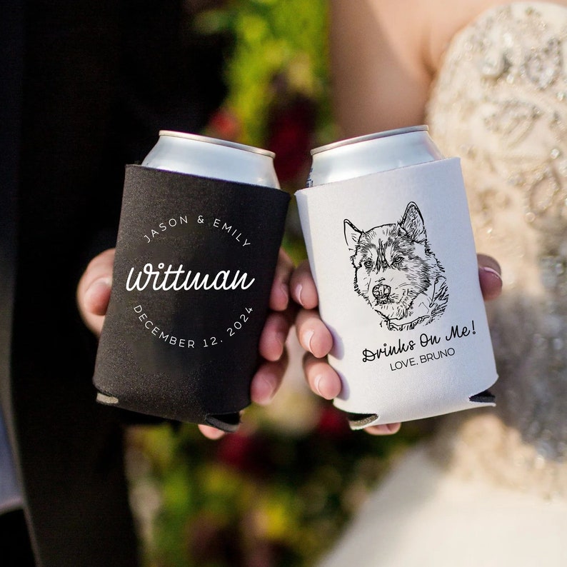 May include: Two black and white can coolers. One cooler has the text "JASON & EMILY Wittman DECEMBER 12, 2024" and the other cooler has the text "Drinks On Me! LOVE, BRUNO" and a black and white illustration of a dog's head.