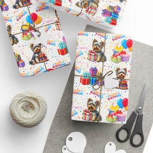 May include: White wrapping paper with a repeating pattern of Yorkshire Terriers, colorful gift boxes, balloons, and the text "Happy Birthday".
