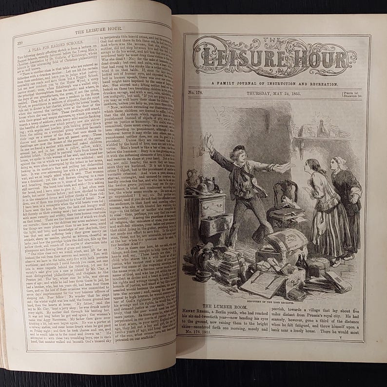 May include: An open book with illustrations and text. The right page features a detailed black and white illustration of a scene with figures, furniture, and scattered objects. The title "THE LEISURE HOUR" is visible at the top.