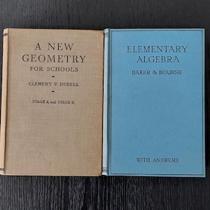 May include: Two vintage textbooks: "A New Geometry for Schools" by Clement V. Durell and "Elementary Algebra" by Baker & Bourne. The geometry book has a tan cover, while the algebra book has a blue cover. Both books are closed and in good condition.