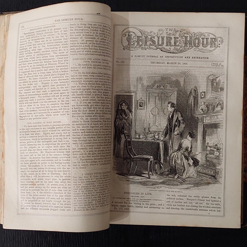 May include: An open book with a black and white illustration titled "The Leisure Hour." The illustration depicts a domestic scene with figures in period clothing, a fireplace, and furniture. The text includes the date "Thursday, March 29, 1866."