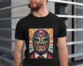 May include: A black t-shirt with a colorful illustration of a wrestler wearing a mask. The mask is red, green, and yellow with a star design. The background is a retro-style design with stars and stripes.