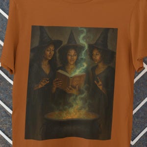 Witchy Trio Halloween T-Shirt: Spell Book & Cauldron Graphic Tee