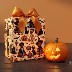 May include: A square gift box wrapped in cream-colored paper featuring a repeating Halloween pattern of children in costumes, pumpkins, black cats, and haunted houses, topped with a large metallic gold bow, next to a glowing orange jack-o'-lantern.