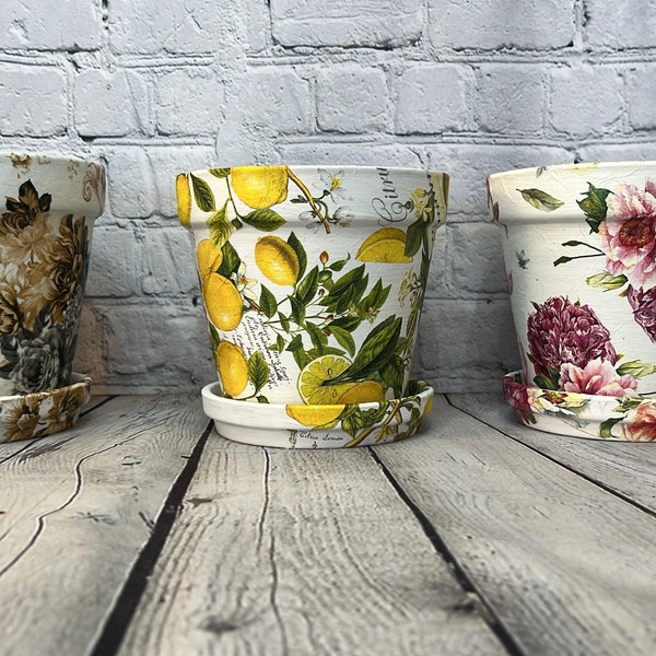 Handcrafted Terracotta pots with floral inspired decoupage design