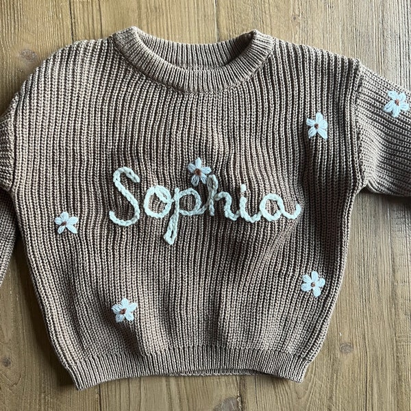 Personalized baby sweater with small flowers