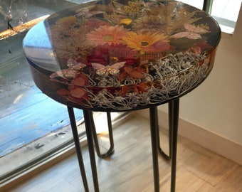 flower bouquet and butterfly resin table, this table can be completely customized to your taste.