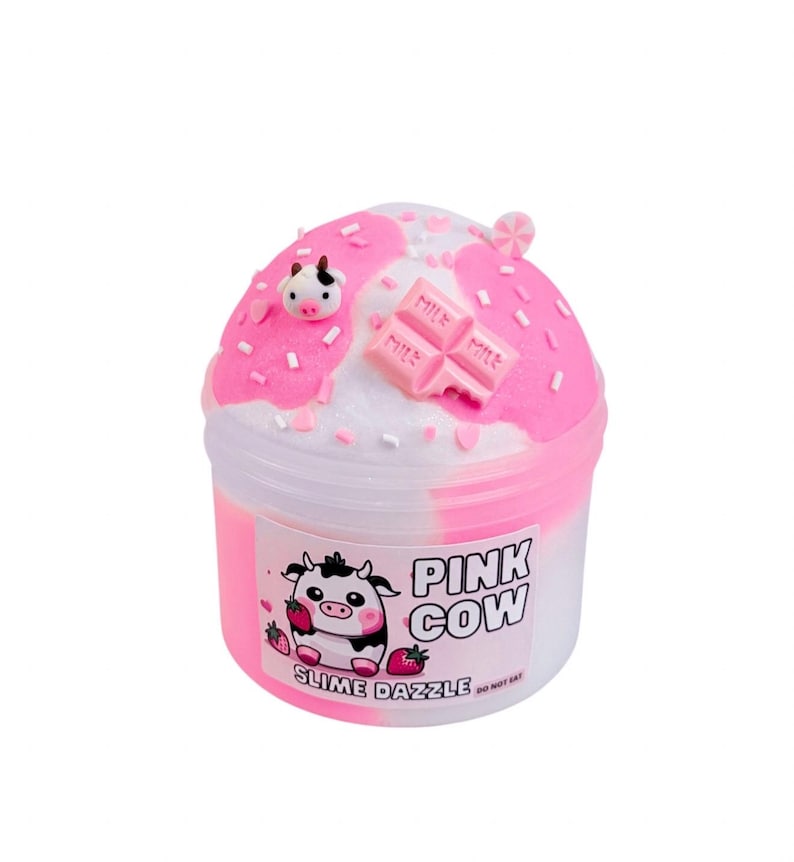 May include: A pot of pink and white slime, featuring a cow graphic and the text "Pink Cow Slime Dazzle." The slime is adorned with pink sprinkles, a cow figurine, and pink chocolate bar shapes. A pink and white swirl design tops the slime.