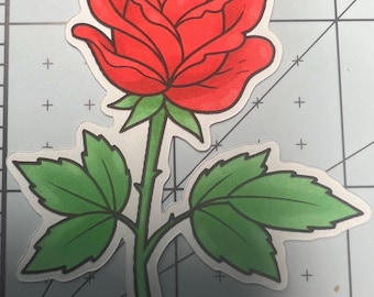 May include: A red rose with green leaves and a stem. The rose is drawn in a cartoon style.