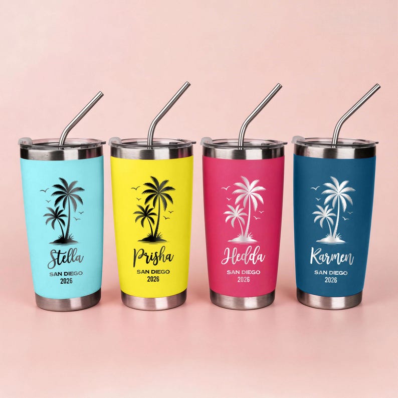 May include: Four stainless steel travel tumblers in blue, yellow, pink, and navy. Each tumbler features a palm tree design and the name Stella, Prisha, Hedda, or Karmen, with "San Diego 2026" below. Each has a silver straw.