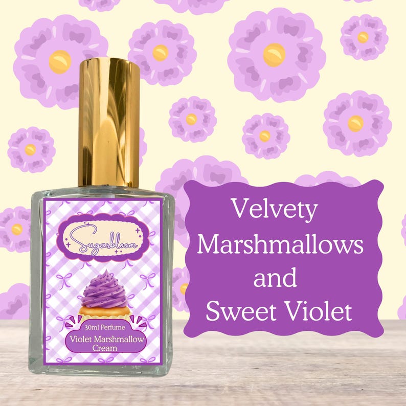 May include: A perfume bottle with a gold cap and a label featuring a purple cupcake illustration. The label reads "Sugarbloom" and "Violet Marshmallow Cream". The background has a floral pattern and the text "Velvety Marshmallows and Sweet Violet".