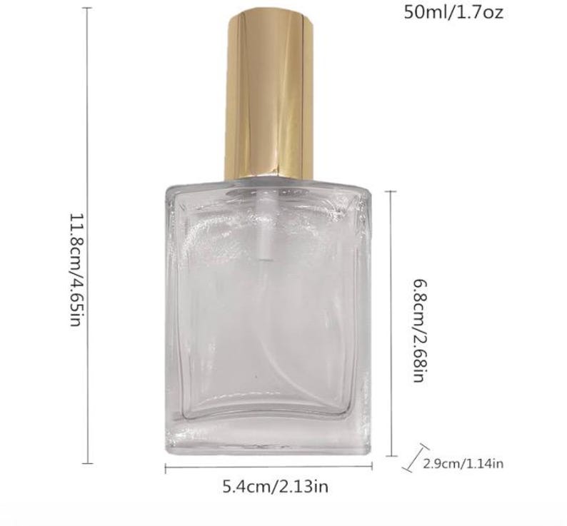 May include: Clear glass perfume bottle with a gold-colored cap. The bottle is rectangular, measuring 4.65 inches high, 2.13 inches wide, and 1.14 inches deep. It holds 1.7 oz of liquid.