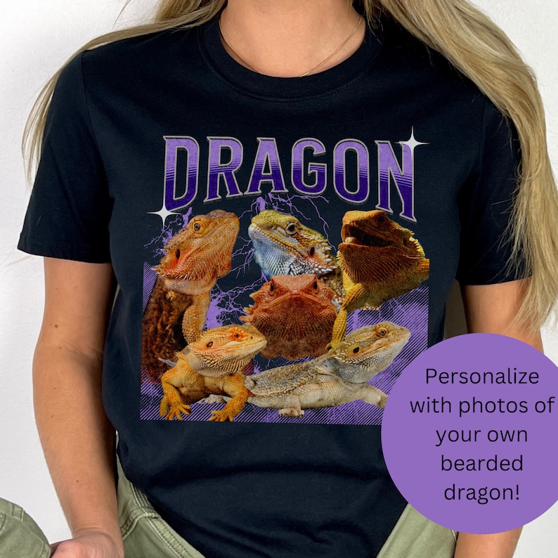 Puede incluir: Camiseta negra con un gr&aacute;fico morado y blanco de varios dragones barbudos. El texto "DRAGON" est&aacute; en letras moradas grandes sobre los dragones. El texto "&iexcl;Personaliza con fotos de tu propio drag&oacute;n barbudo!" est&aacute; en texto blanco sobre un c&iacute;rculo morado en la esquina inferior derecha de la imagen.