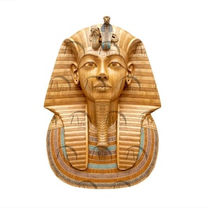 May include: A detailed wooden sculpture of an Egyptian pharaoh's mask. The mask features a serene face, a striped headdress, and a cobra emblem. The colors include shades of brown, gold, blue, and turquoise, creating a regal appearance.