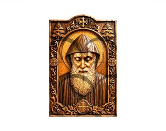 May include: A rectangular wooden wall plaque featuring a detailed relief carving of a bearded figure wearing a hooded robe. The central figure is framed by ornate scrollwork, two small pine trees, and crosses, with a circular halo behind the head.