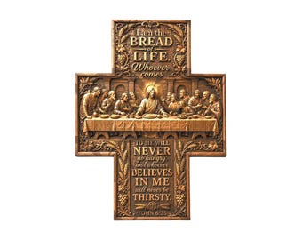 May include: A brown wooden cross-shaped wall plaque featuring a relief carving of the Last Supper. The top section reads I am the BREAD of LIFE. Whoever comes, and the bottom section reads TO ME WILL NEVER go hungry and whoever BELIEVES IN ME will never be THIRSTY. JOHN 6:35.