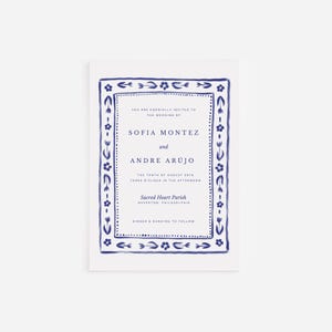 May include: A white wedding invitation with a blue floral border and text. The invitation includes the names Sofia Montez and Andre Arujo, the date, and the location: Sacred Heart Parish, Philadelphia.