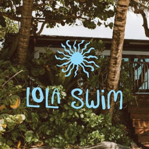 May include: Image of a tropical scene with the text "LOLA SWIM" in light blue, along with a light blue sunburst graphic. Lush green foliage and palm trees frame a wooden structure in the background.