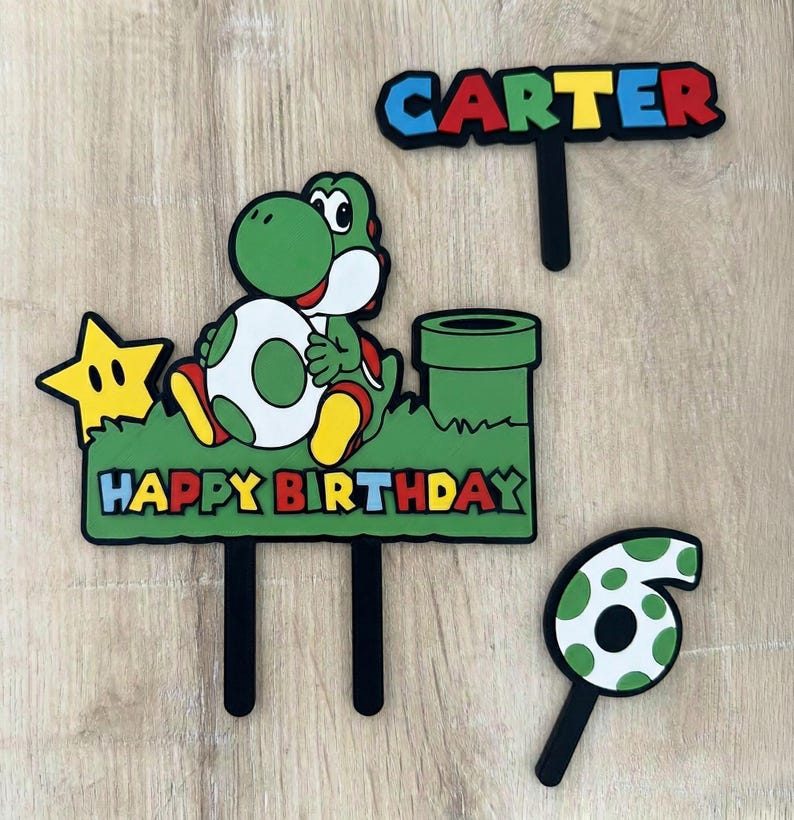 May include: A trio of ceramic mugs with a speckled, matte finish in cream, light grey, and dark grey. Each mug features a minimalist design and a rounded handle. Suitable for tea or coffee, these mugs offer a simple, modern aesthetic.