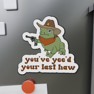 aimant drôle de grenouille de cowboy de Zazzle.be Liste d'envies Vous avez des idées ? Aimant de noyau de maison de campagne | Carte de tarot magnétique pour réfrigérateur | Aimant drôle hippie mignon