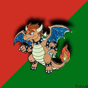 May include: A cartoon-style enamel pin featuring a dragon with orange and tan coloring, blue glitter wings, and a spiked collar. The dragon has a flame at the end of its tail. The background is split diagonally, with red and green sections.
