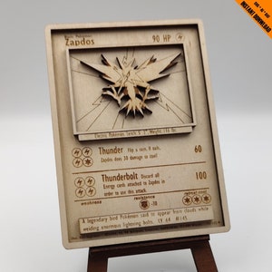 Pokémon Zapdos - Tarjeta de madera - 145 - 16/102 - Archivos de corte láser para madera - ¡Solo archivos de corte láser SVG/AI/DXF! + Soporte gratuito