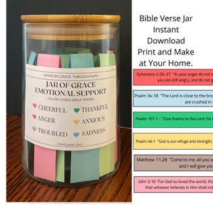 May include: A glass jar filled with colorful paper notes with Bible verses printed on them. The jar is labeled "Jar of Grace Emotional Support" and has a wooden lid. The notes are color-coded to represent different emotions, such as cheerful, thankful, angry, troubled, anxious, and sad. The jar is a printable download and can be made at home.