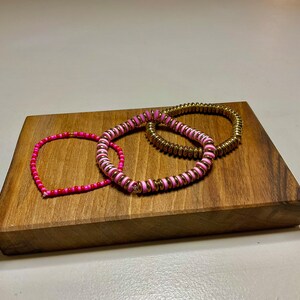 Fabulous clay bead bracelets. You can customize your own however you want! Choose from child, small, medium, or large sizes.
