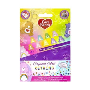 May include: A Care Bears Crystal Art keyring package. The package features a rainbow background with Care Bears characters. The text on the package reads "Care Bears", "11 to collect!", and "Crystal Art KEYRING".
