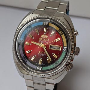 Men's Orient KD Automatic Watch, Burgundy red Dial, 21 Jewels, Cracked Glass