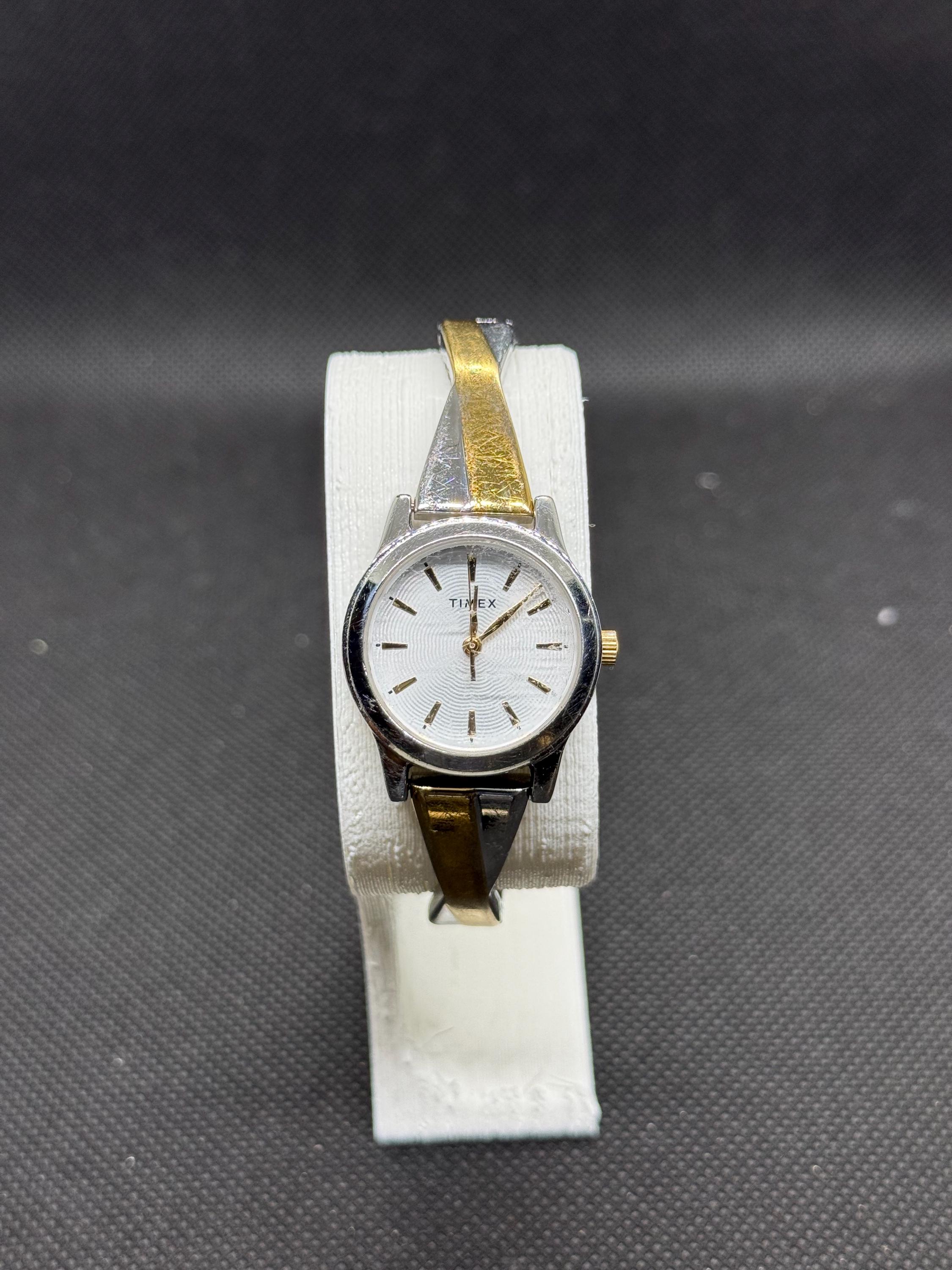 Ladies vintage golden Timex with a stretchy band Vintage Timex Classic Womens Womans Gold & Silver Analog  main image 3