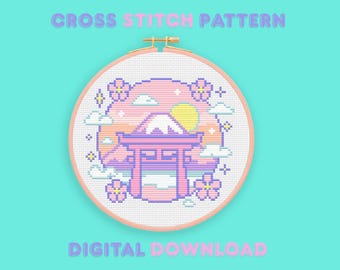 May include: A cross-stitch pattern featuring a Japanese landscape with Mount Fuji, a torii gate, and cherry blossoms. The design is in pastel colors, with the text "CROSS STITCH PATTERN" and "DIGITAL DOWNLOAD". The pattern is displayed in a round embroidery hoop.