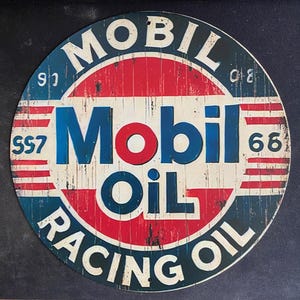 vintage advertising enamel sign