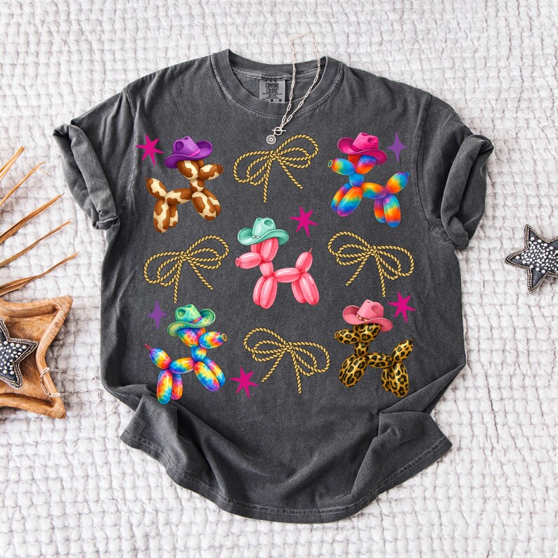 High-quality PNG design featuring cute Western balloon dogs wearing colorful cowboy hats in cow print, pink, tie-dye, and leopard patterns, surrounded by rope bows and retro stars; perfect for trendy coastal cowgirl T-shirts, rodeo shirts, Nashville bachelorette party outfits, girls trip apparel, country concert looks, western bachelorette decor, boho cowgirl gifts, summer rodeo outfits, and western fashion. 300 DPI transparent background for sublimation, DTF and DTG printing and craft projects.
