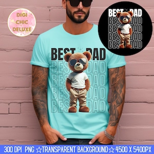 Puede incluir: Una camiseta azul claro con el texto "BEST DAD" repetido verticalmente. La camiseta presenta un oso de dibujos animados con gafas de sol y pantalones color caqui. Un gráfico circular con el mismo oso y texto está en la esquina superior derecha.
