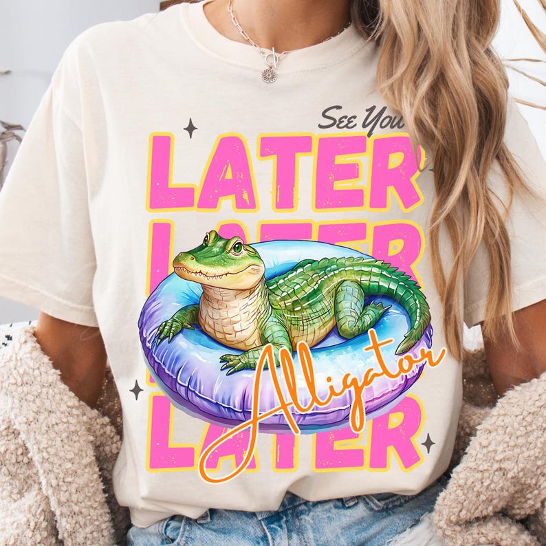 Funny “See You Later Alligator” t-shirt PNG design with cute hand drawn watercolor alligator lounging in a pool float, retro pink and yellow text, summer vacation vibes, beach day shirt, animal humor tee, playful wildlife graphic tee, tropical novelty shirt, kids or adult funny alligator shirt, swamp theme apparel, southern charm gifts, Florida summer shirts, best-selling lake trip shirts, popular quirky animal t-shirt design PNG.