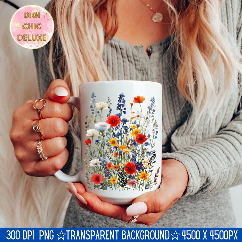 May include: White ceramic mug with a colorful floral design featuring red, blue, yellow, and white flowers. The flowers are arranged in a cluster and appear to be watercolor painted.