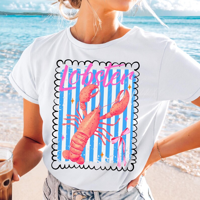 Bold watercolor lobster design with pink bow on nautical blue and white stripes — perfect for coastal cowgirl aesthetic, seafood lovers, Maine lobster festival gifts, retro summer beach vibes, ocean-themed apparel, and girly cottagecore fans. Trendy crustacean print for quirky fashion, East Coast preppy style, Y2K nautical chic, or seaside travel souvenir. Great for lobster parties, boating outfits, or colorful graphic tees with a fun foodie twist.