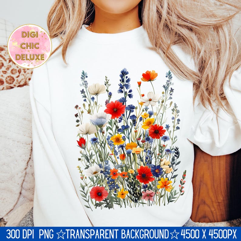 May include: A white sweatshirt with a colorful floral design featuring red, blue, yellow, and white flowers. The design is centered on the front of the sweatshirt.