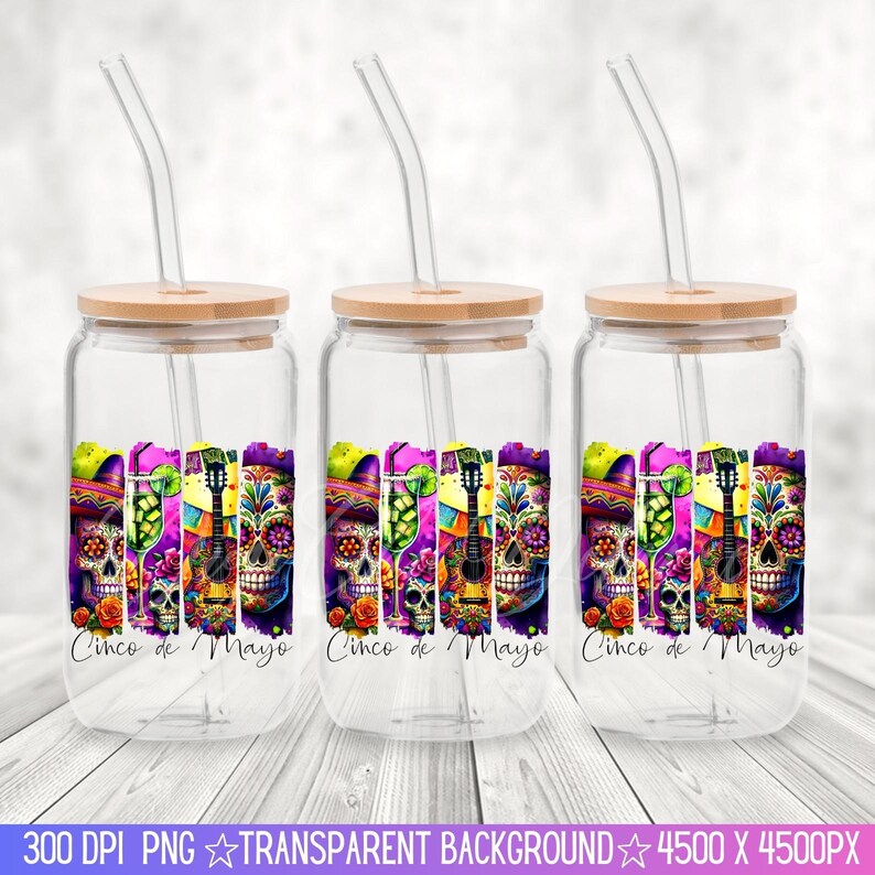 May include: Three clear glass tumblers with bamboo lids and straws. Each tumbler features a colorful design with a sugar skull, flowers, and a guitar. The text "Cinco de Mayo" is printed on each tumbler.