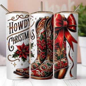 May include: Three stainless steel tumblers with a white background and colorful designs. The tumbler on the left has the text "Howdy Christmas" with a red poinsettia and a rope design. The middle tumbler has a red, green, and gold cowboy boot with a floral design. The tumbler on the right has a red bow with a gold cowboy boot.