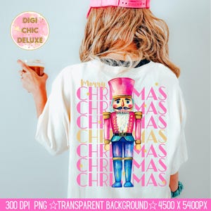 Hand-painted watercolor nutcracker soldier Christmas PNG design in vibrant pink, gold, and blue with festive stars and layered “Merry Christmas” lettering. Perfect for holiday shirts, Christmas party outfits, Nutcracker ballet gifts, winter home décor, festive wall art, seasonal apparel, cozy holiday decorations, and Christmas gift ideas for women and kids.