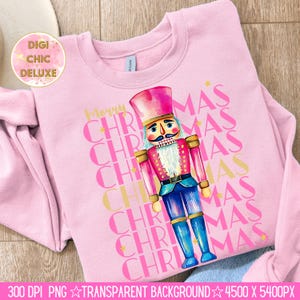 Hand-painted watercolor nutcracker soldier Christmas PNG design in vibrant pink, gold, and blue with festive stars and layered “Merry Christmas” lettering. Perfect for holiday shirts, Christmas party outfits, Nutcracker ballet gifts, winter home décor, festive wall art, seasonal apparel, cozy holiday decorations, and Christmas gift ideas for women and kids.