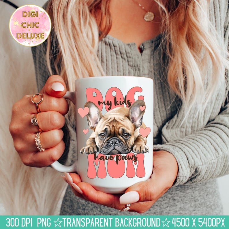 May include: White ceramic mug with a pink design featuring a French bulldog and the text "Dog my kids have paws Mom".