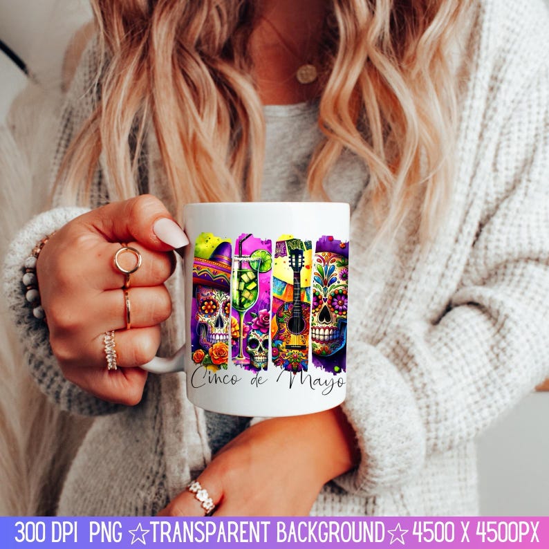 May include: White ceramic mug with a colorful design featuring sugar skulls, a guitar, a margarita glass, and the text "Cinco de Mayo".