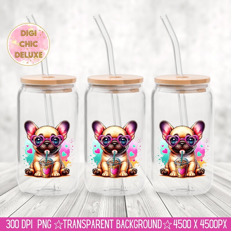 May include: Three clear glass tumblers with bamboo lids and straws. Each tumbler features a cartoon French bulldog wearing pink heart-shaped sunglasses and drinking a beverage. The background is a watercolor-style design with pink hearts and blue accents.