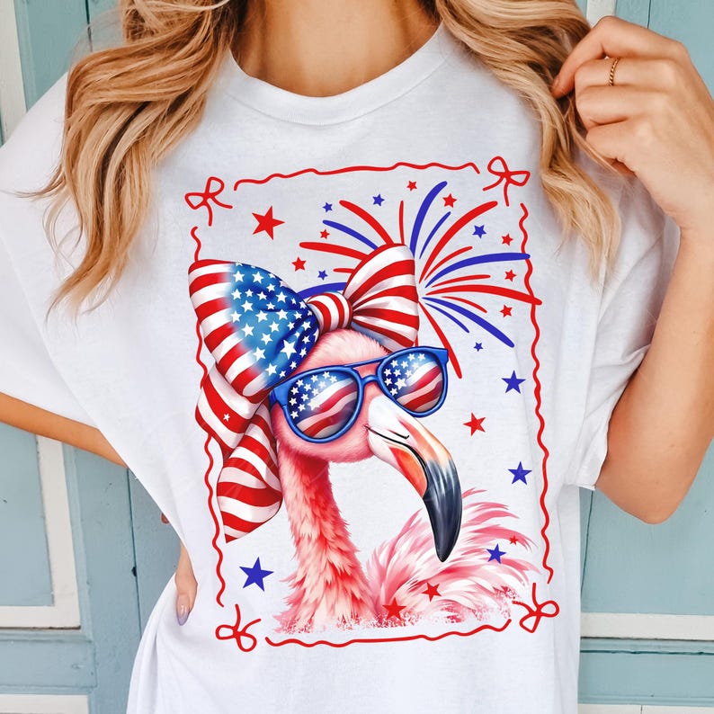 High quality hand drawn watercolor patriotic flamingo PNG design with USA flag coquette bow and American sunglasses, surrounded by red, white and blue fireworks. Perfect for 4th of July shirts, Independence Day outfit, beach party tee, funny summer graphic t-shirt tee, July Fourth flamingo lover gift, America-themed BBQ look, retro cute animal design, and trending patriotic women’s apparel. Great for lake days, family matching sets, coastal grandma style, and summer vacation fashion.